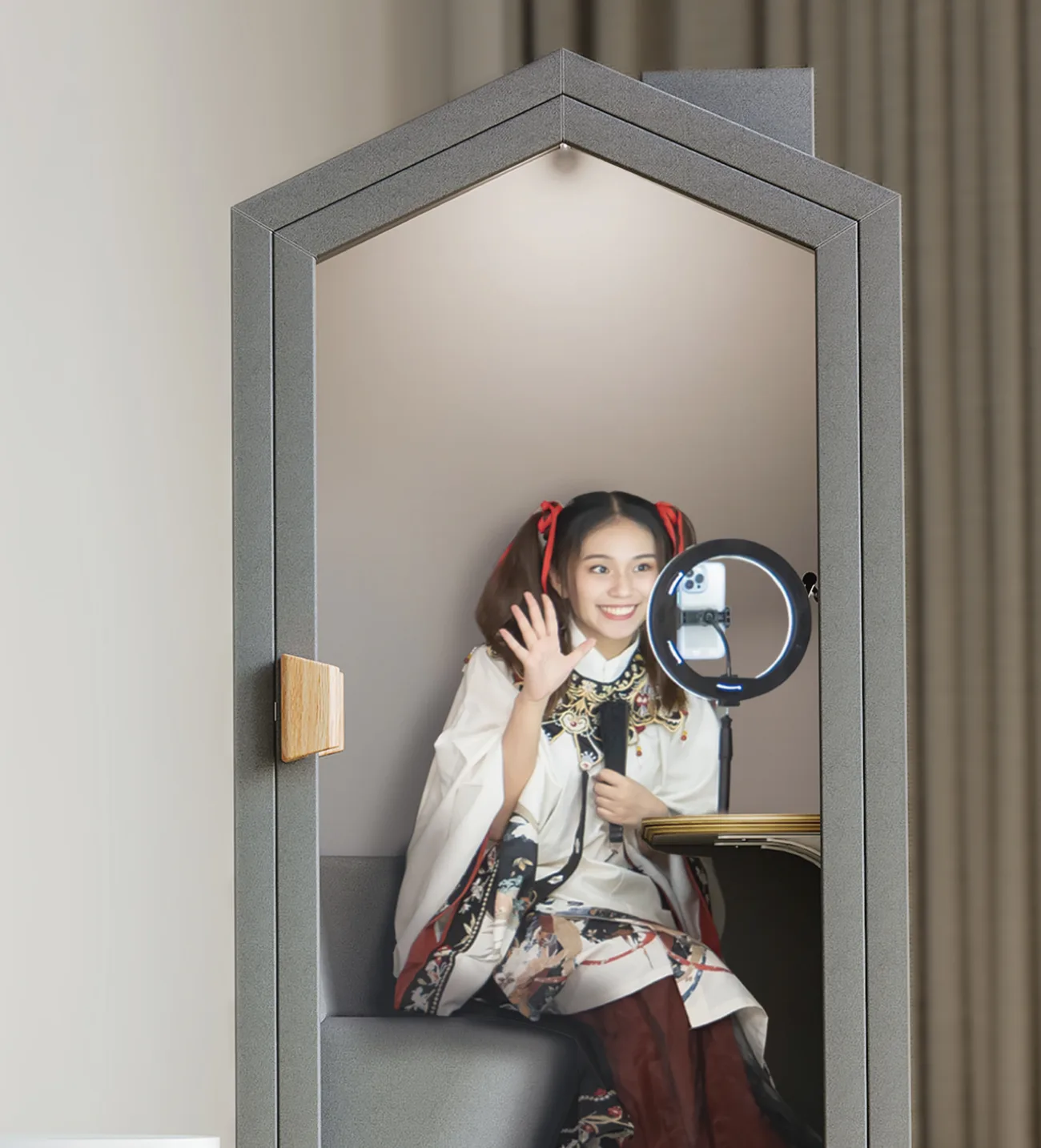Girl recording content inside the SonicHive Home Pod